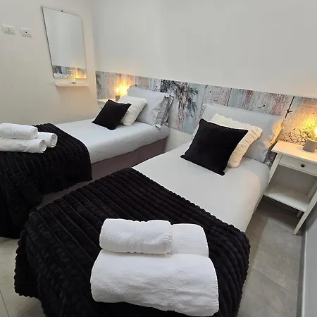 דירה Raymihome Lugaro - Parking Privato *